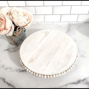 Beaded wood riser